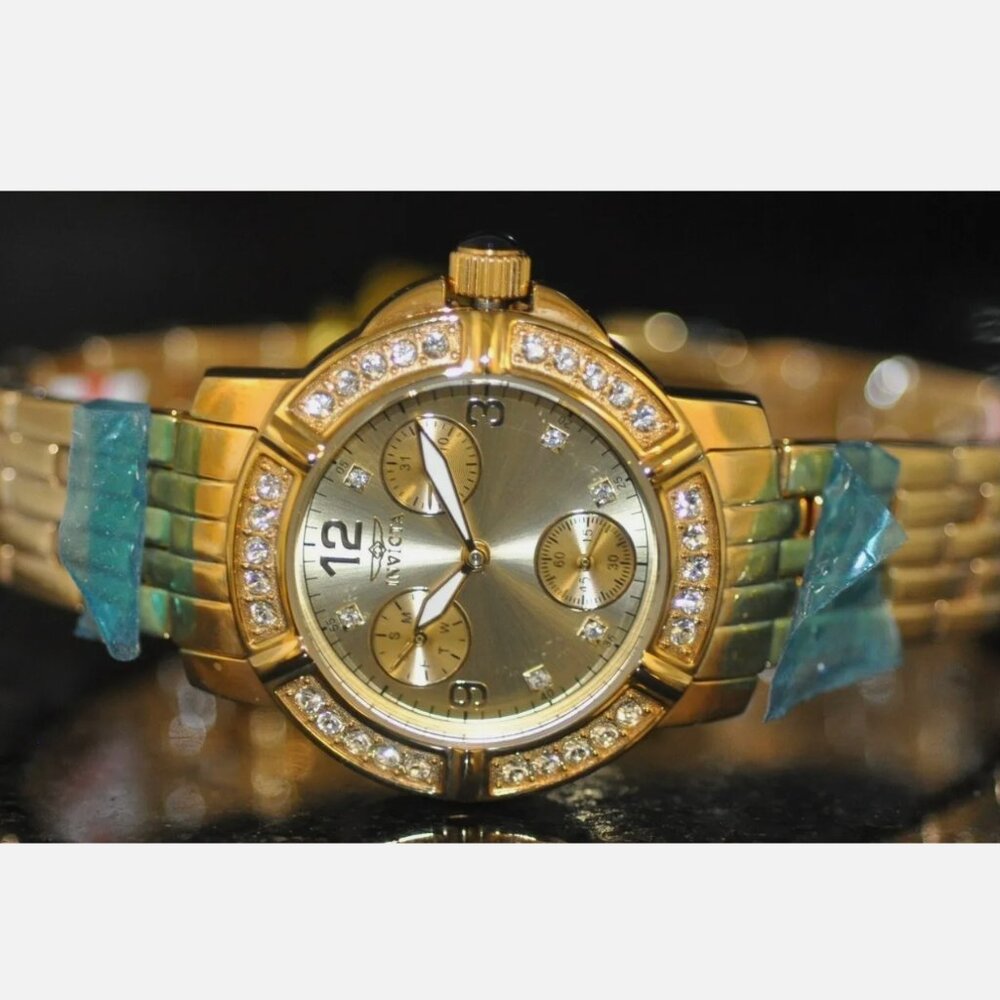 Ladies 18kt Gold Angel Dial Watch Steel